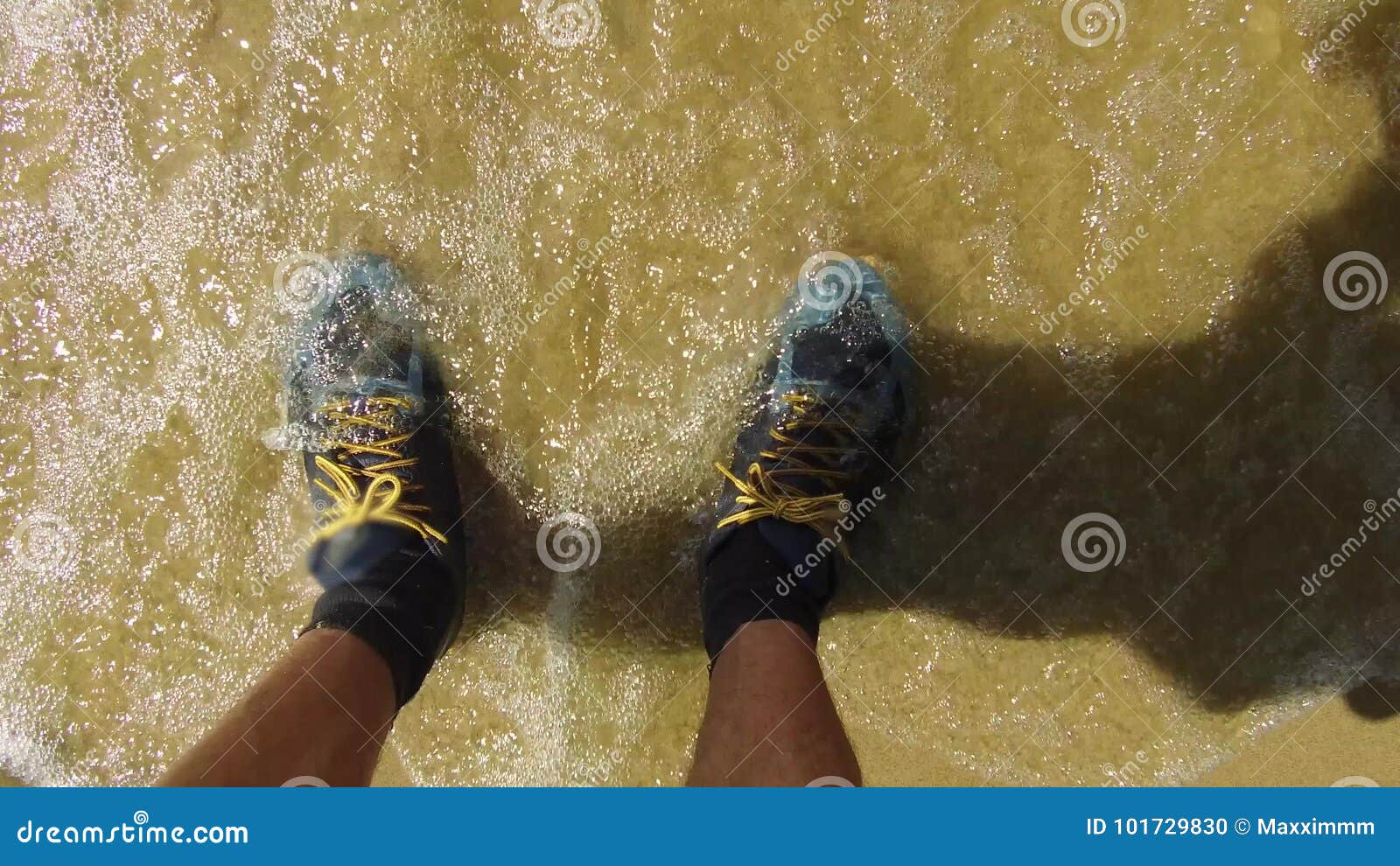 Men Legs in Sneakers. Man is Standing on the Seashore Sand Waves Wet ...
