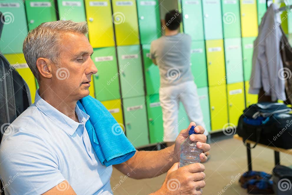 Men in locker room stock image. Image of child, posing 104033125