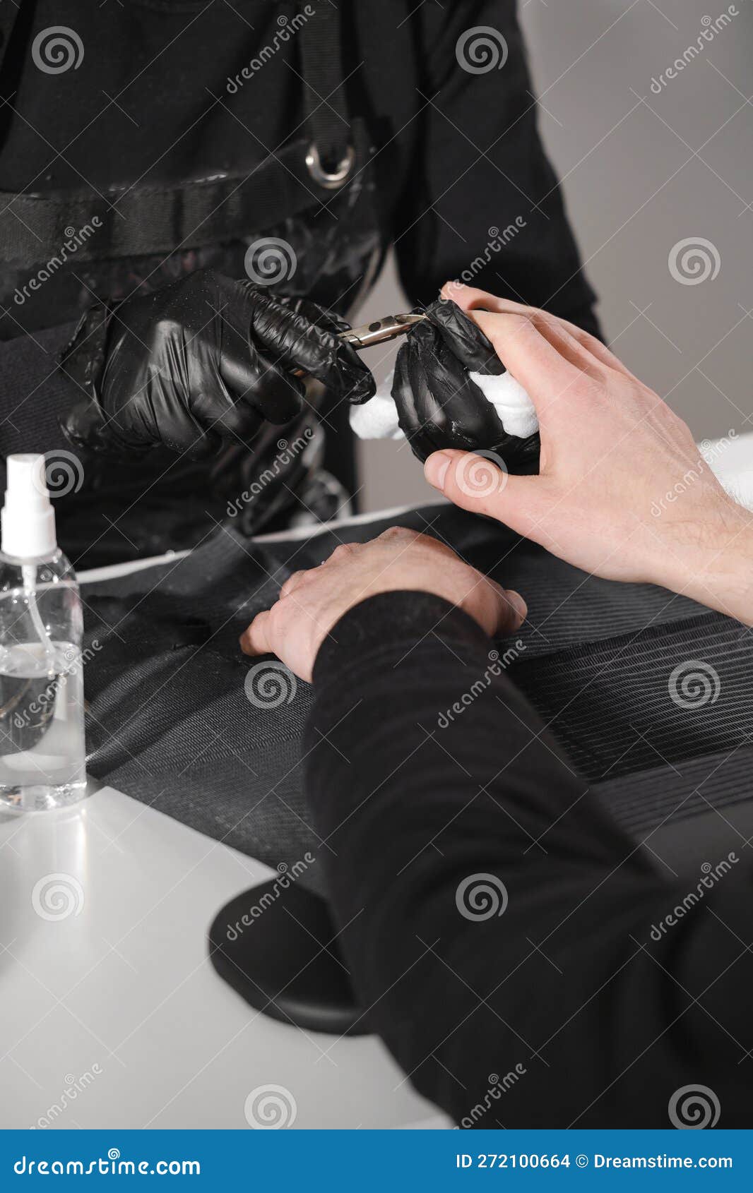 manicure for men. close up view of the nail service master doing manicure for man