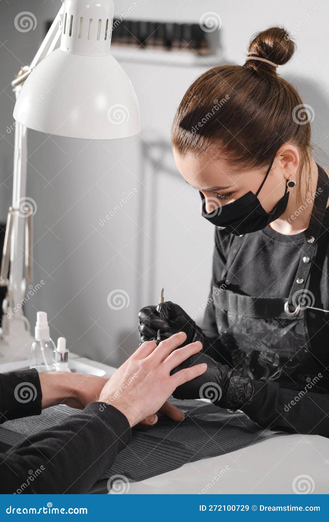 manicure for men. close up view of the nail service master doing manicure for man