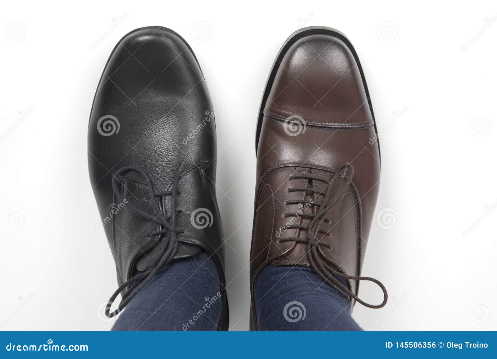 Men`s Feet in Different Color Classic Shoes on White Background Stock ...