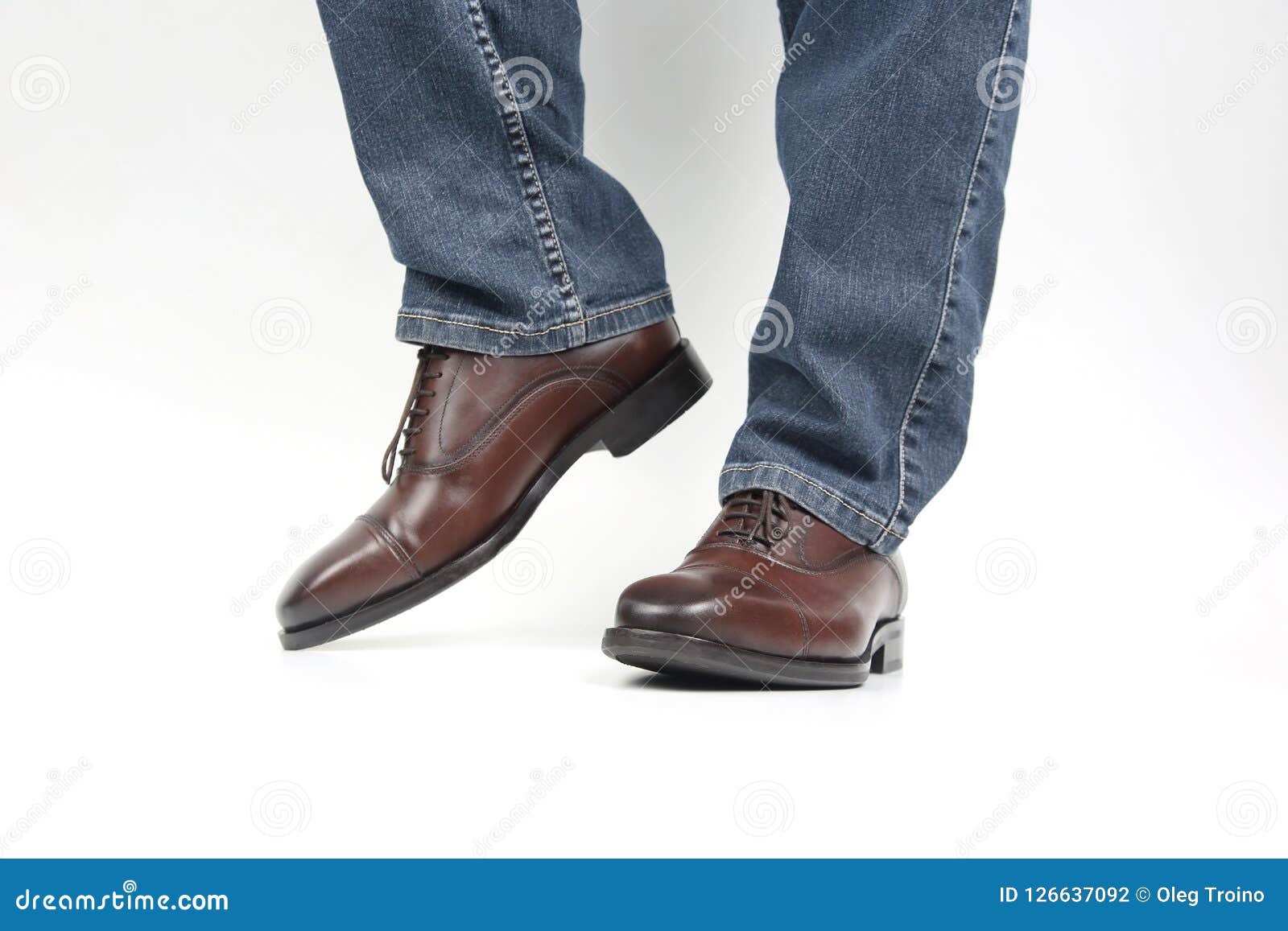Men`s Legs in Jeans Shod in Classic Brown Oxford Shoes Stock Photo ...