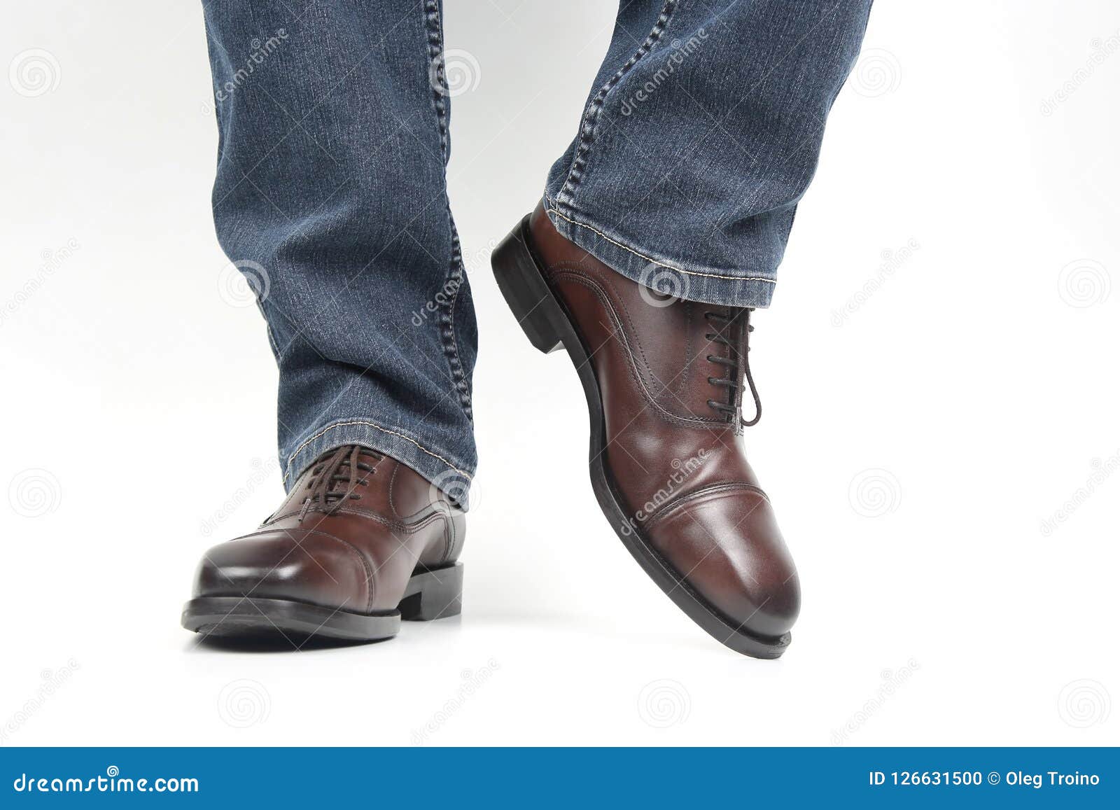 Men`s Legs in Jeans Shod in Classic Brown Oxford Shoes Stock Photo ...