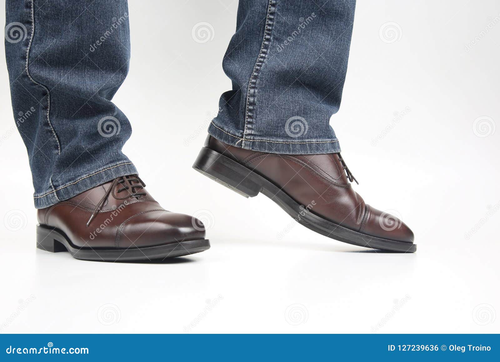 Men`s Legs in Jeans Shod in Classic Brown Oxford Shoes Stock Photo ...