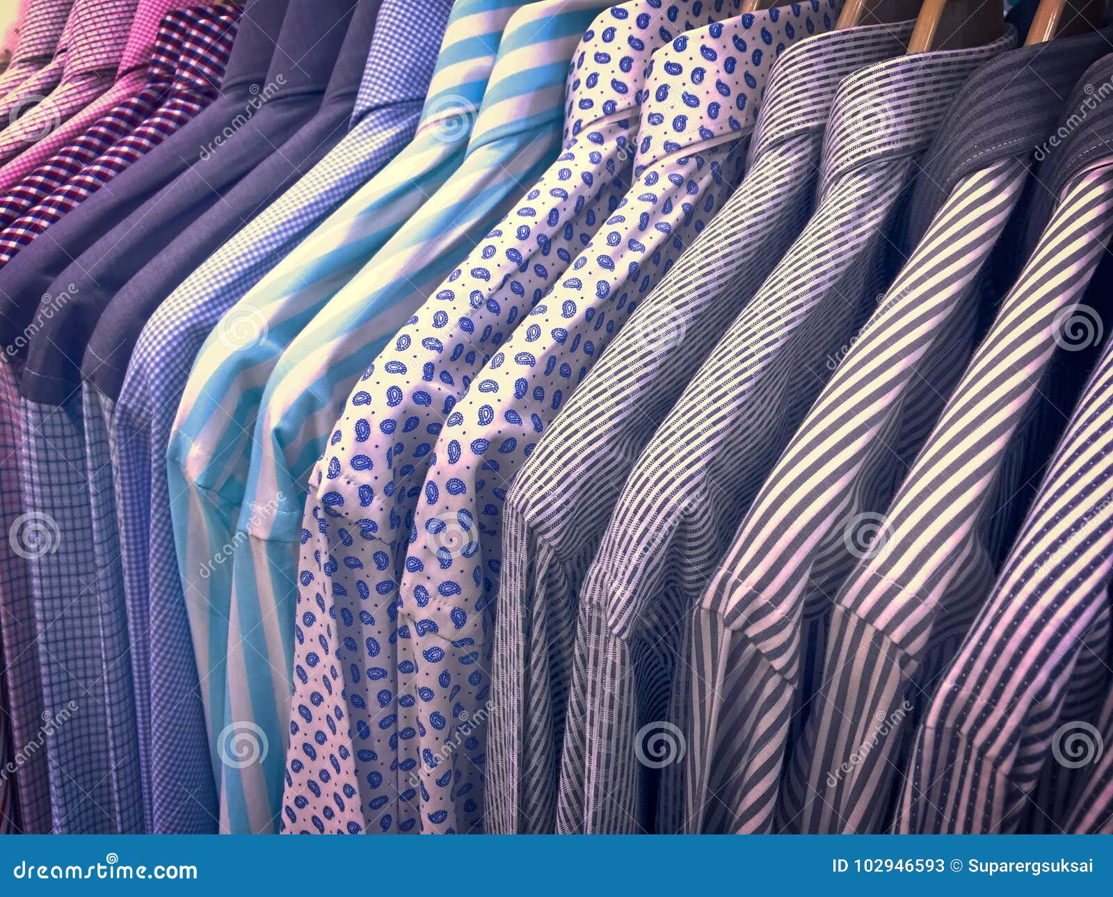 male analogy Receiver Men`s Long Sleeve Patterned Shirts on Rack Stock Image - Image of sleeve,  collection: 102946593