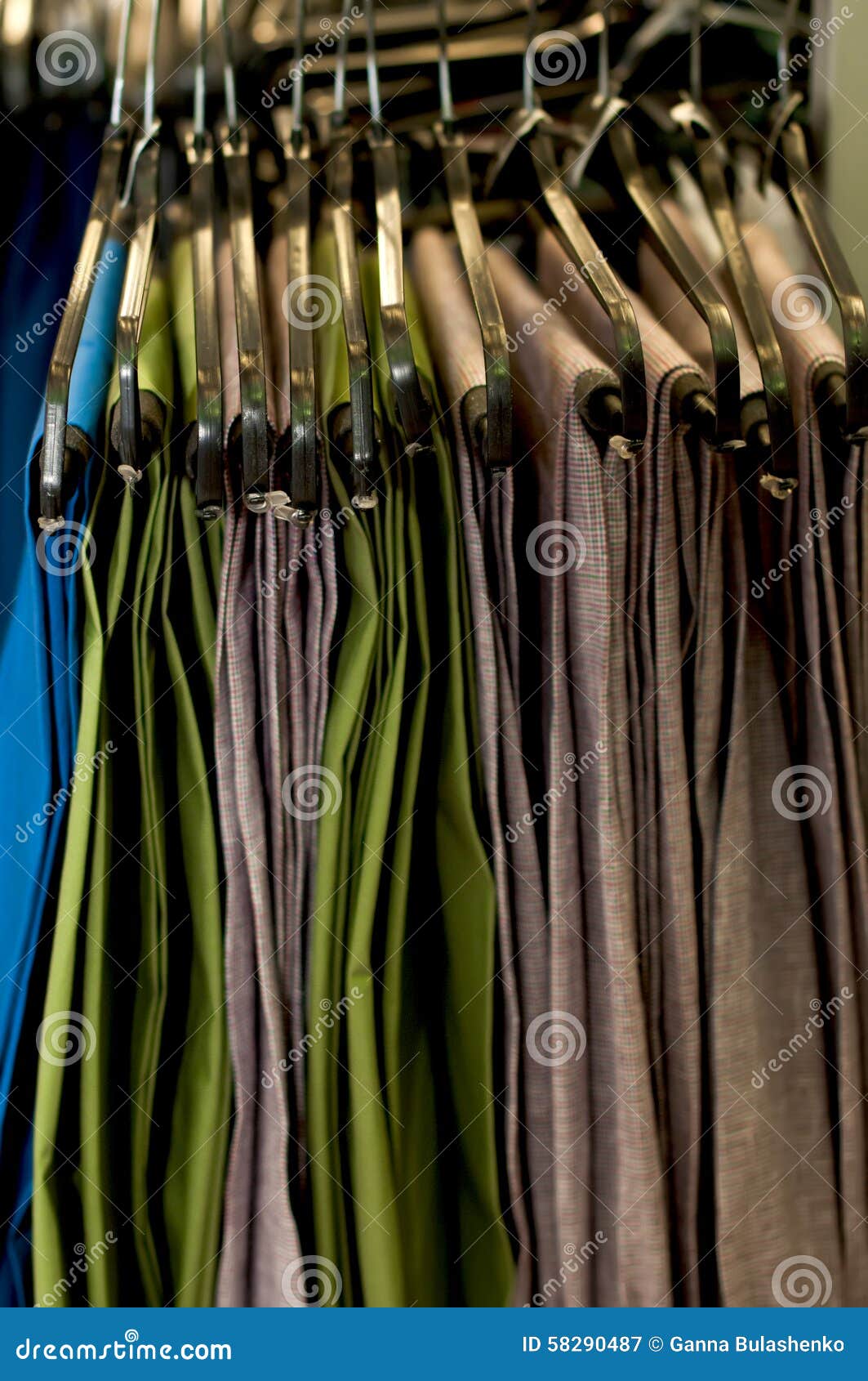 Men s pants on hangers. stock image. Image of garment 58290487