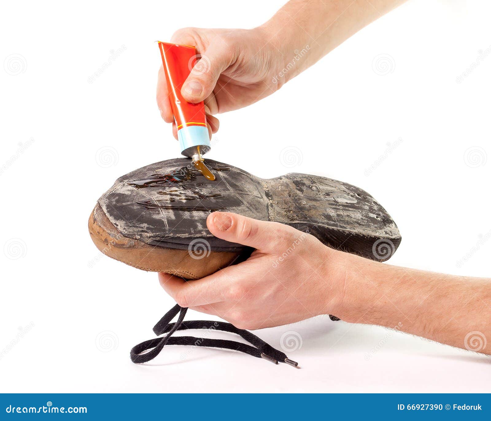Men s shoes glue hands. stock photo. Image of fashion 66927390