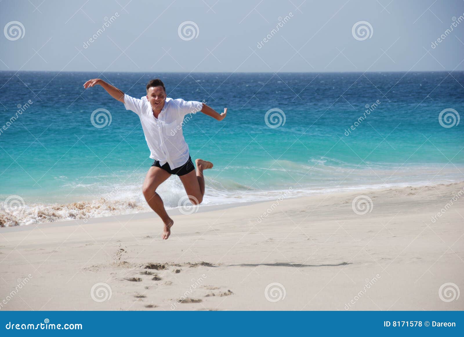 Men on Sandy Beach - Blue Ocean Stock Photo - Image of santa, cabo: 8171578