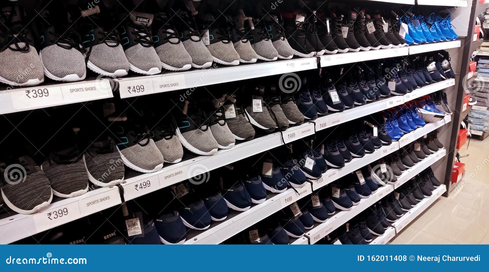 Men Sport Shoes Arrange At Shoe Corner At Shopping Mall