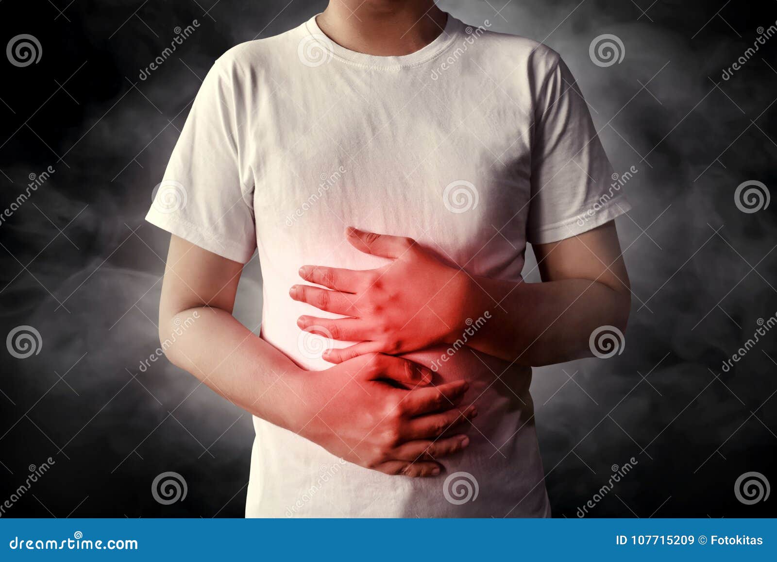 men stomach ache on smoke background