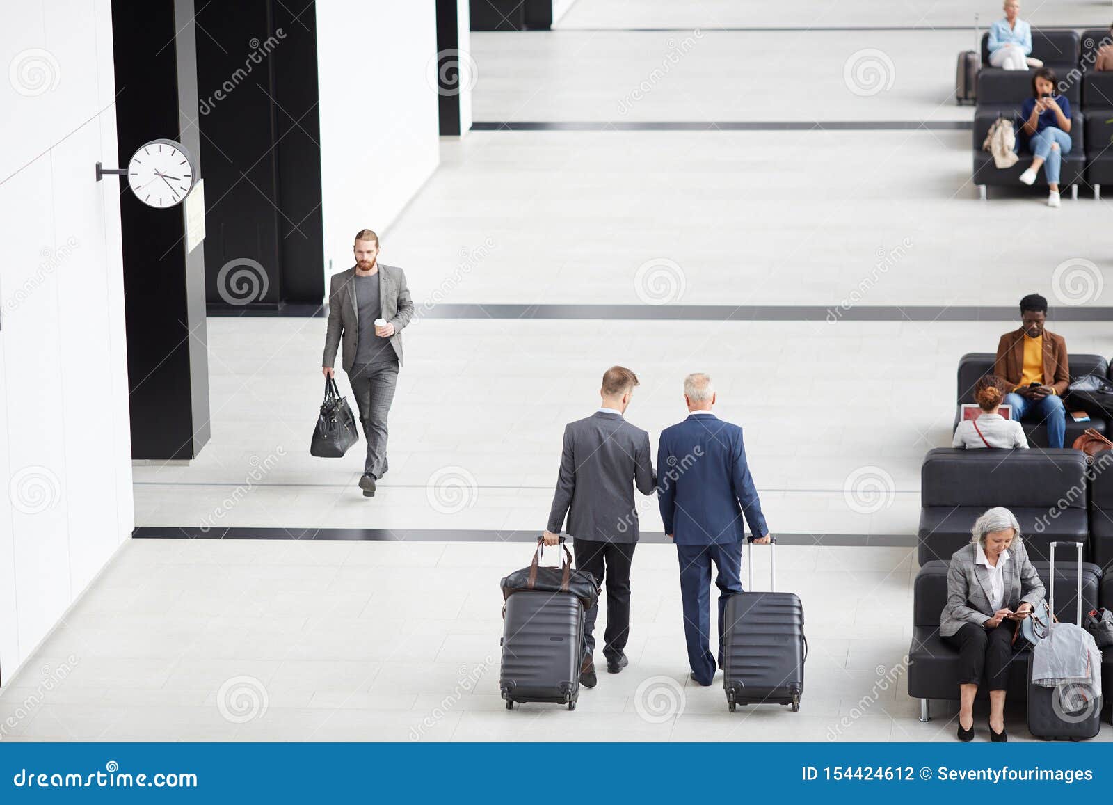 Men in Suits Moving Along Airport Stock Photo - Image of baggage ...