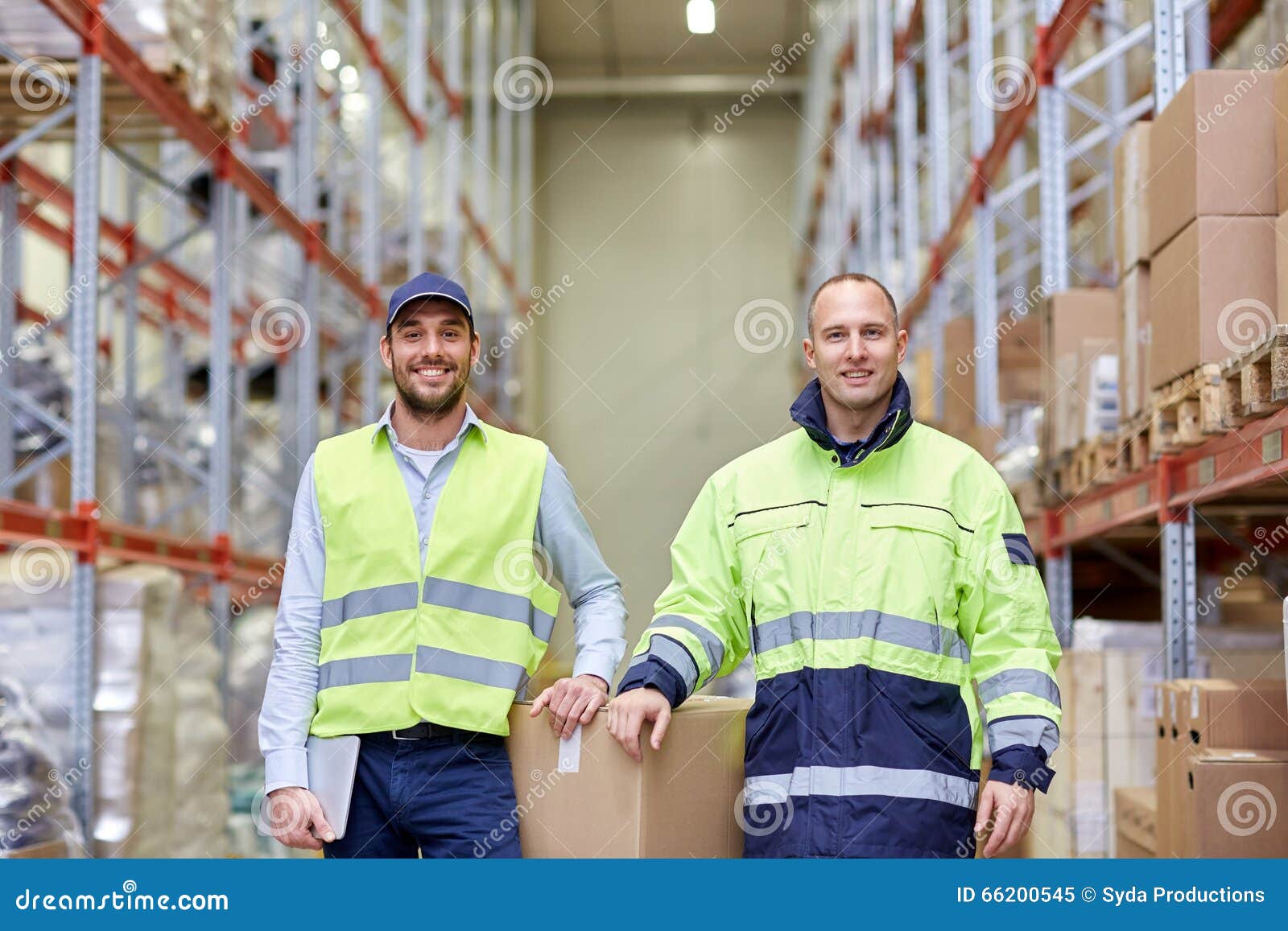 Men in Uniform with Boxes at Warehouse Stock Image - Image of labor