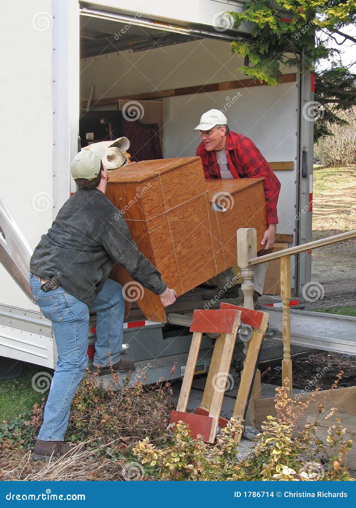 Men unload a moving van stock photo. Image of load, house - 1786714