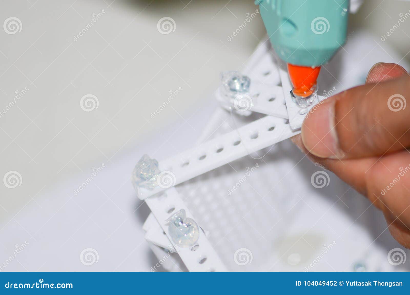 Men are Using Hot Glue To the Device Electricity. Stock Photo Image of hobby, glue 104049452