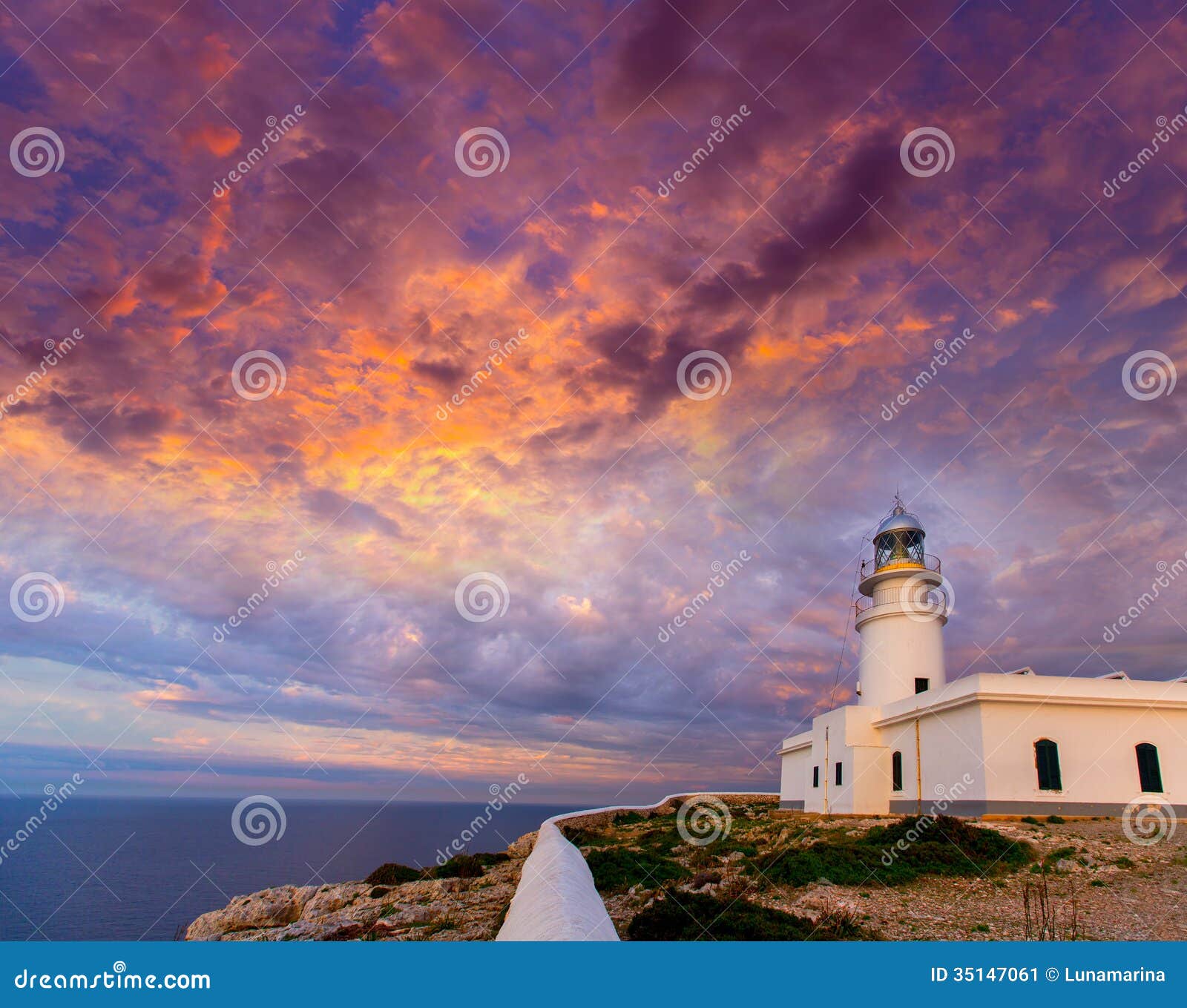 menorca sunset at faro de caballeria lighthouse