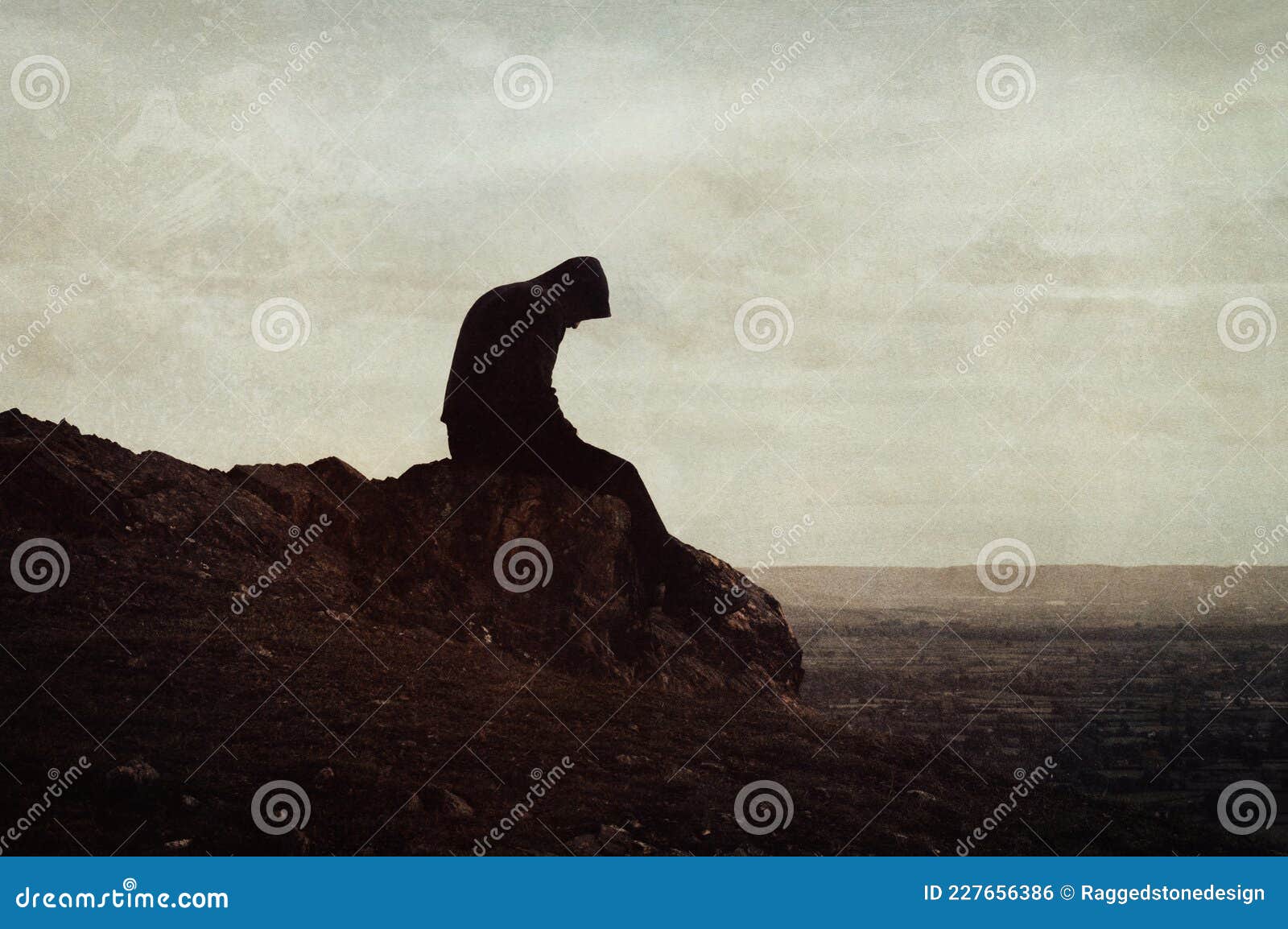 A Mental Health Concept of a Sad Lonely Hooded Figure Sitting on Top of ...