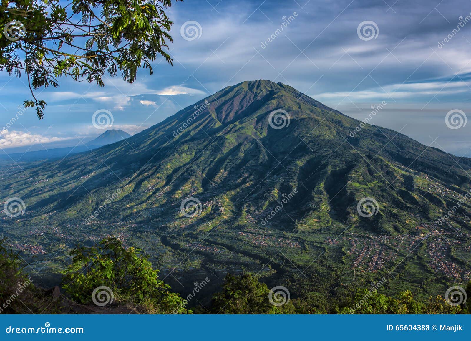 Merbabu volcano in Java stock photo. Image of mountain - 65604388