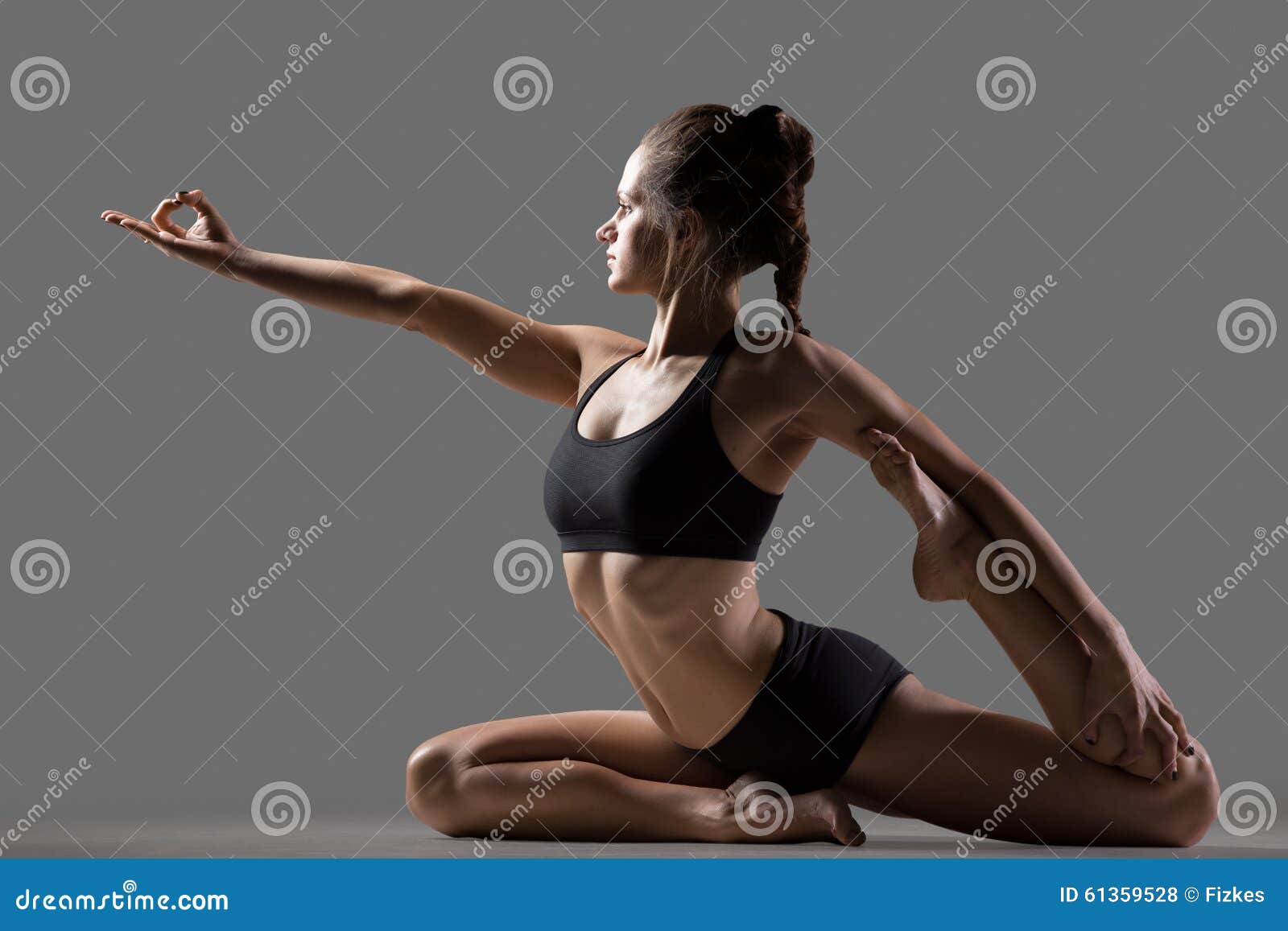 Performs yoga hi-res stock photography and images - Page 2 - Alamy