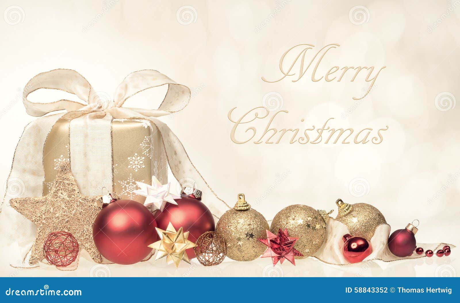 merry christmas card with gift and ornaments