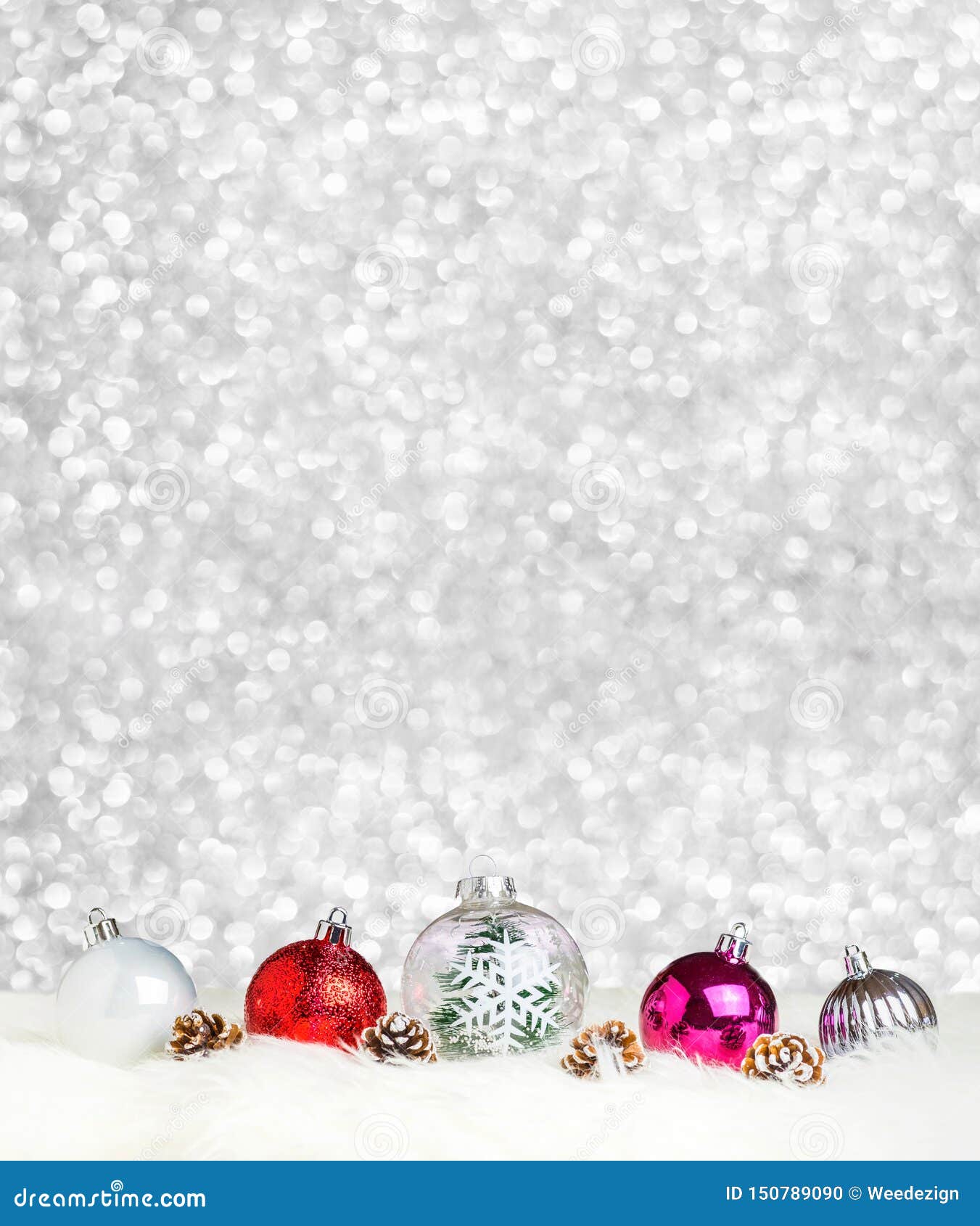 merry christmas decoration ball on white fur at silver bokeh light background,banner vertical holiday greeting card