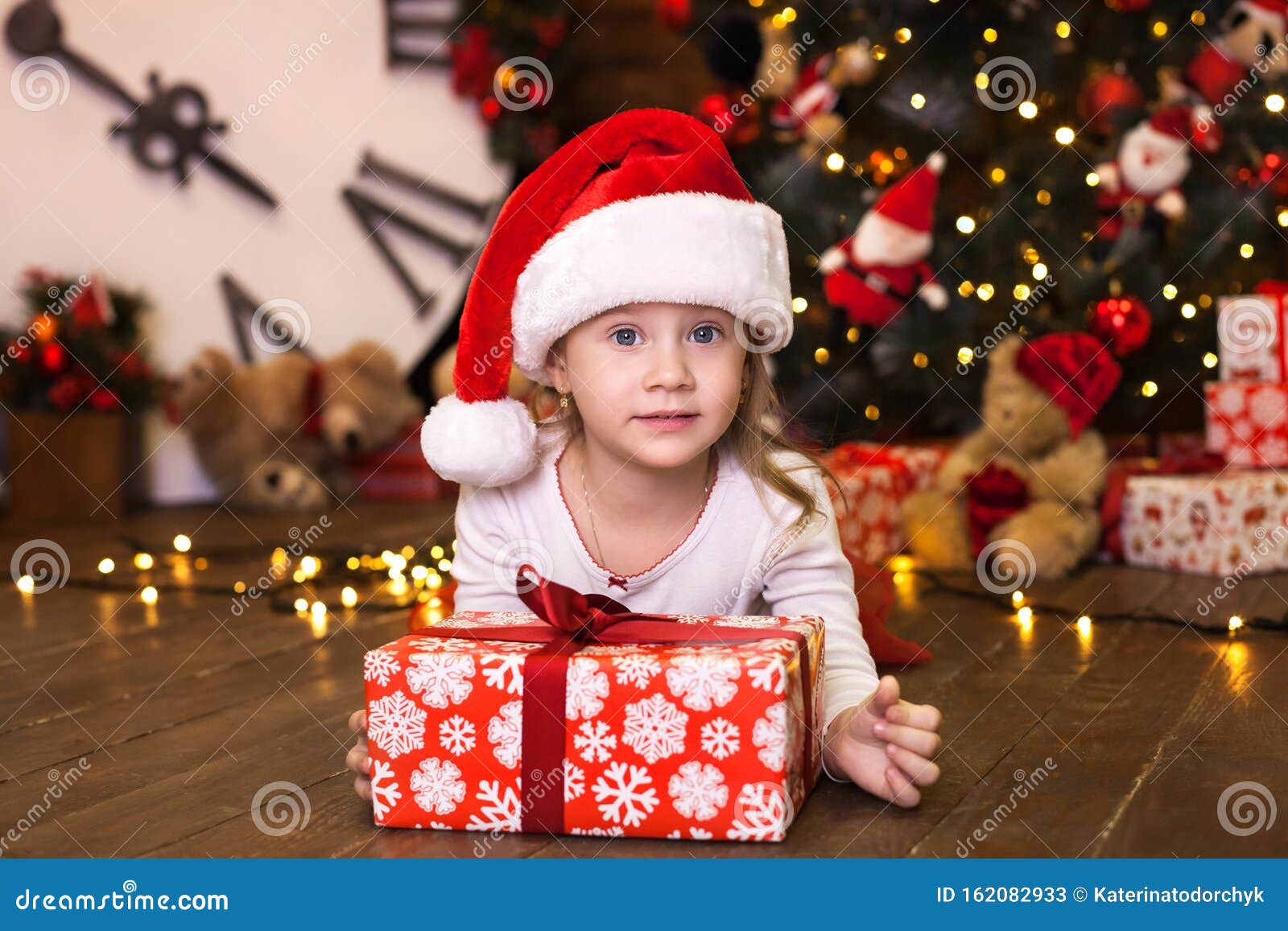 Merry Christmas And Happy Holidays. New Year 2020. Portrait Of Smiling Cute Little Girl In Red ...