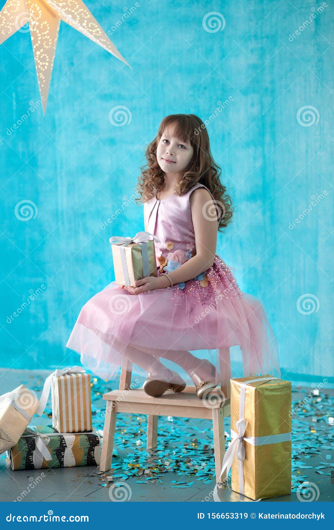 Merry Christmas And Happy New Year 2020! Cute Little Girl Opens A Gift And Smiles. Beautiful ...