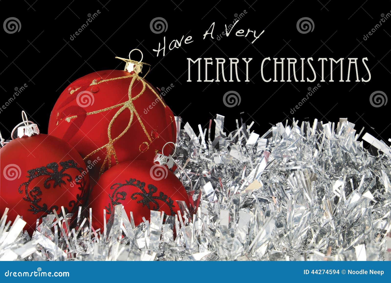 Merry Christmas With Red Baubles On Tinsel Stock Photo 