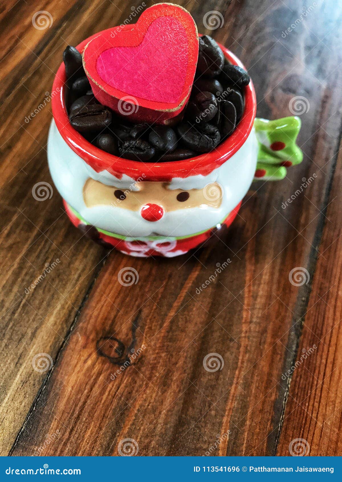 Merry Christmas, Red Heart and Coffee Beans in Cute Santa Claus Cup
