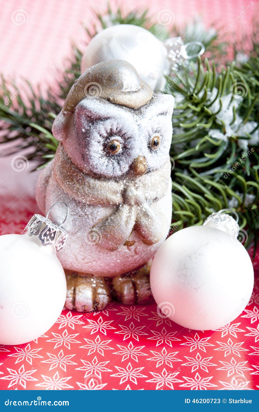 A statue of owl with Christmas decoration like a concept for merry Christmas