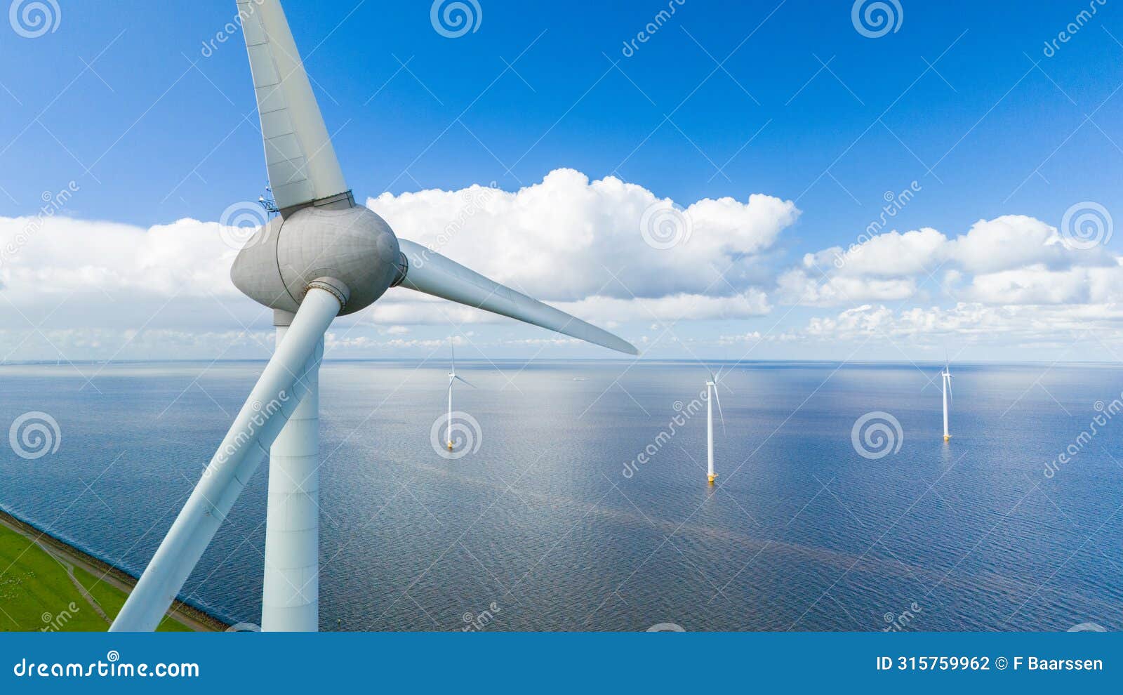 a mesmerizing view of wind turbines gracefully spinning in the ocean, harnessing the power of the wind to generate clean