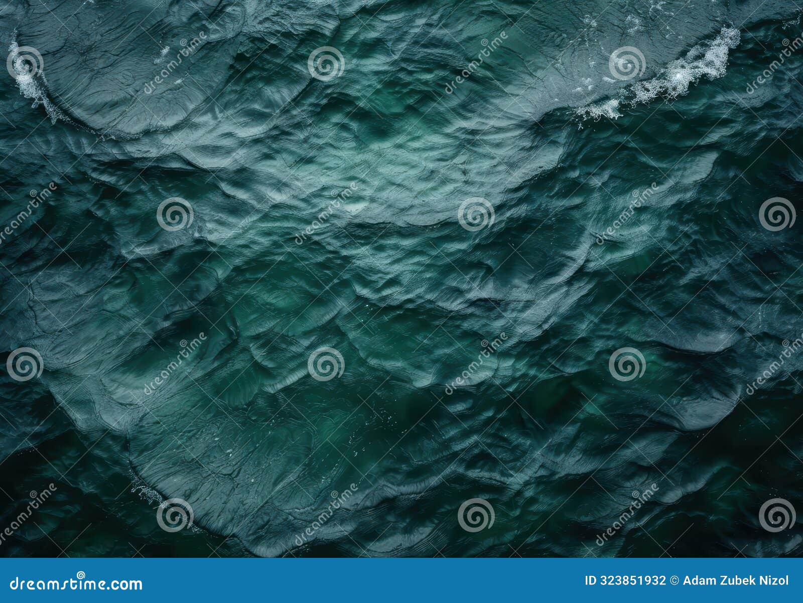 mesmerizing waves of deep teal water
