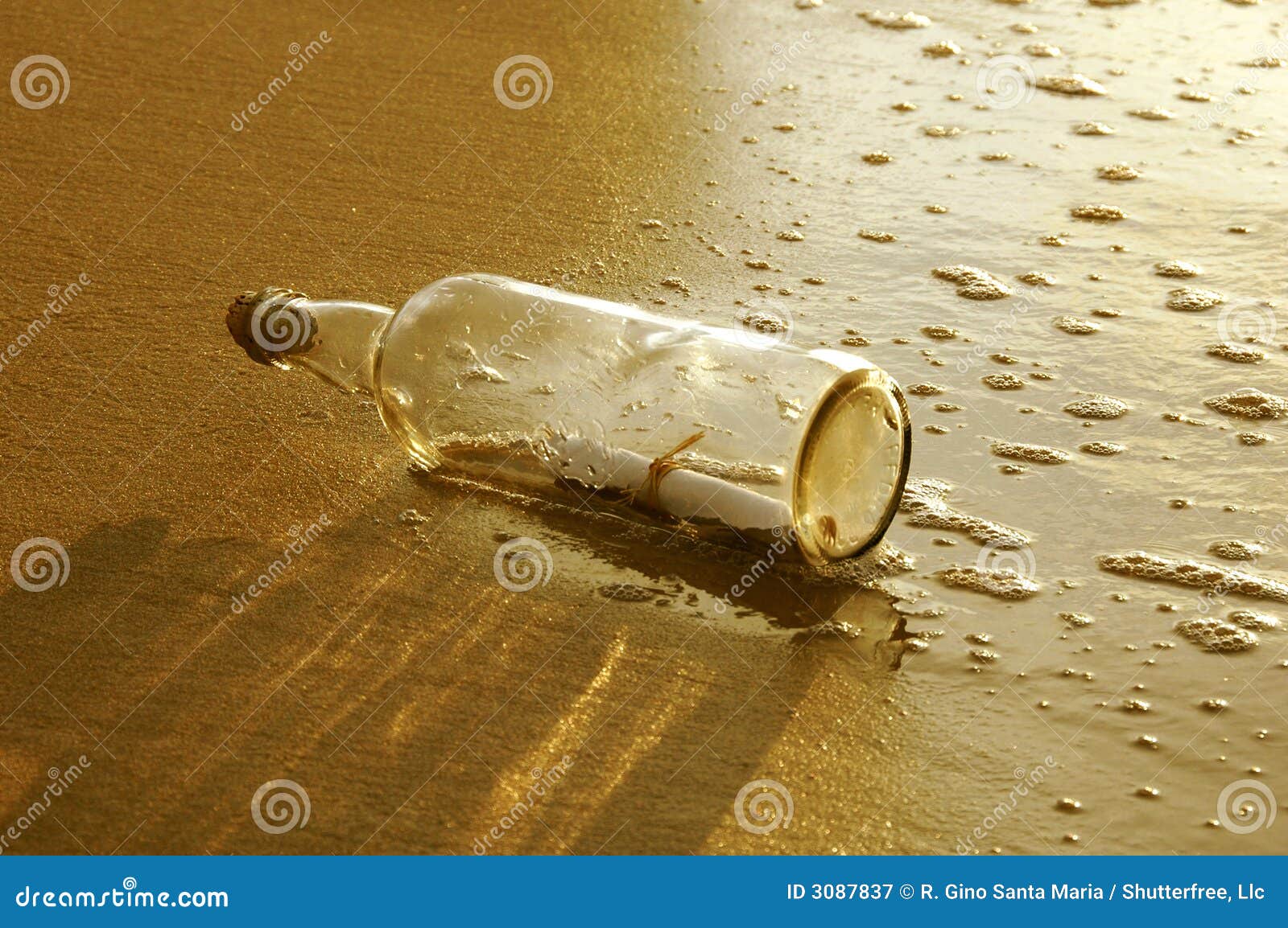 message in a bottle at sunset