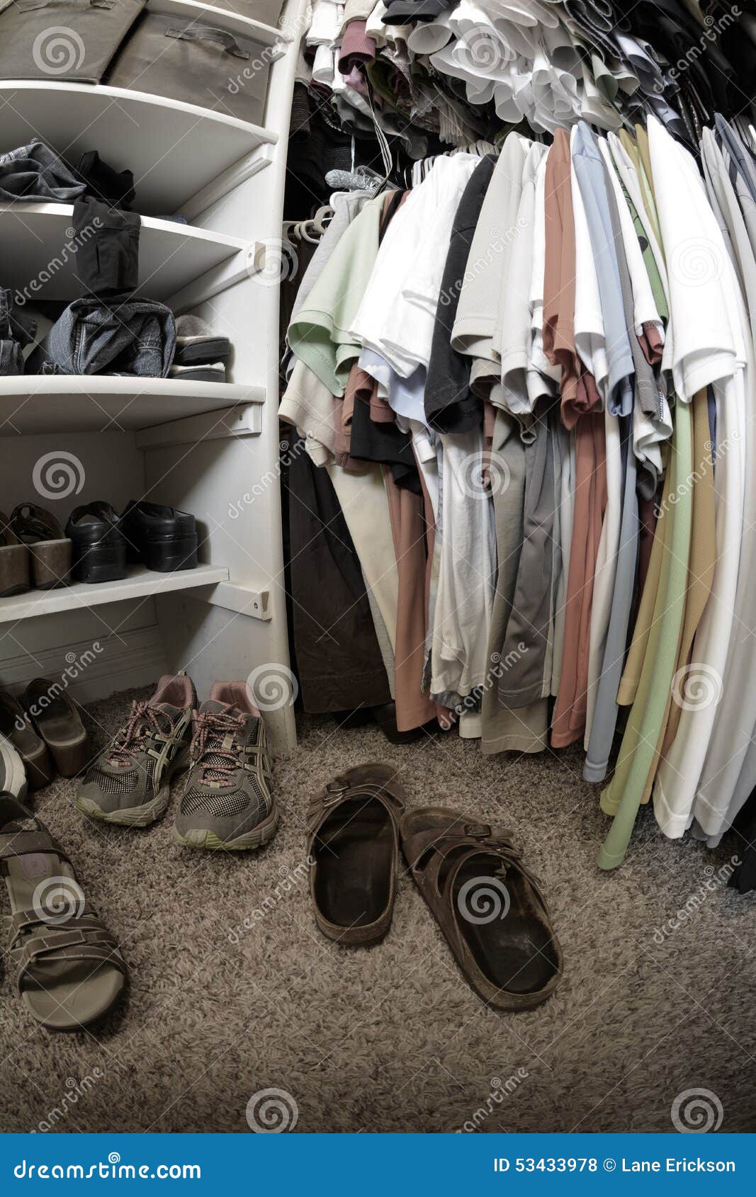 messy closet in house with clothes and shoes