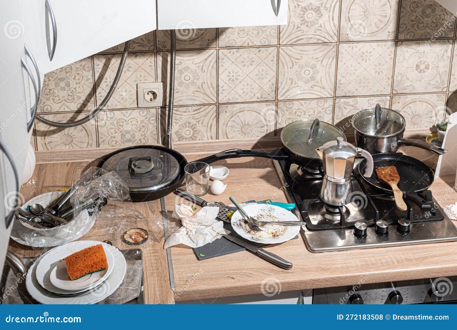 Messy Kitchen with Dirty Dishes Piled Up in the Sink and on the Counter ...