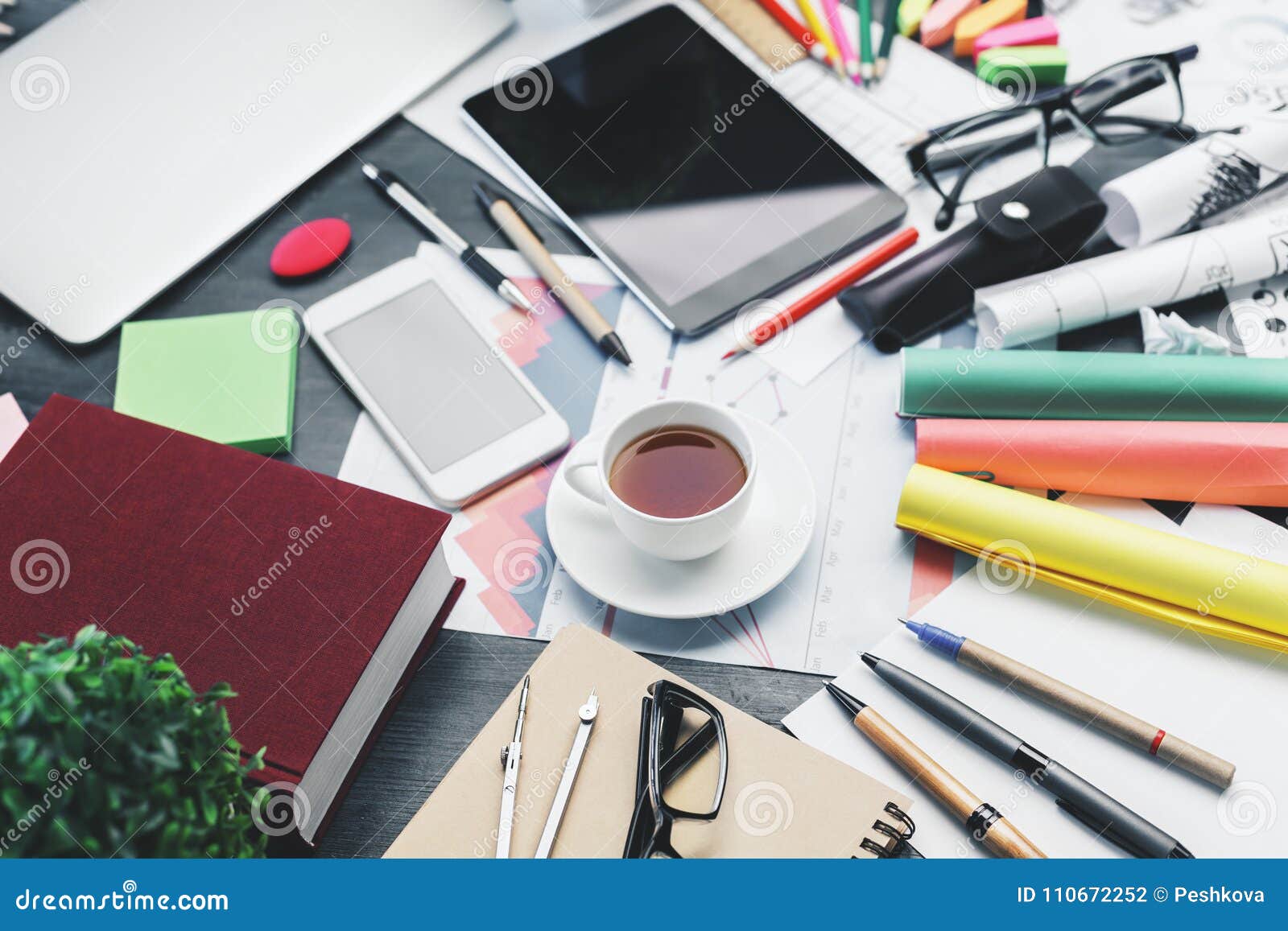 Messy office desk top stock photo. Image of mess, close - 110672252