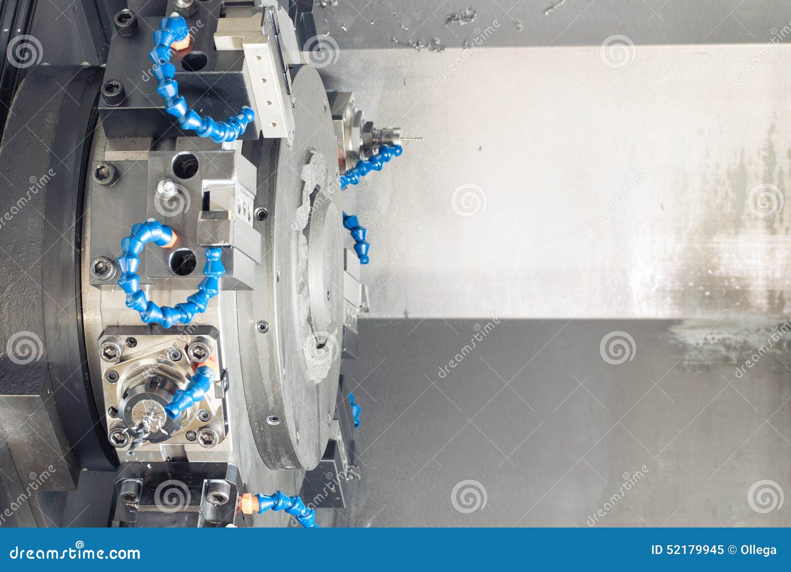 Metal Blank Machining Process on Lathe with Tools and Coolant at Steel