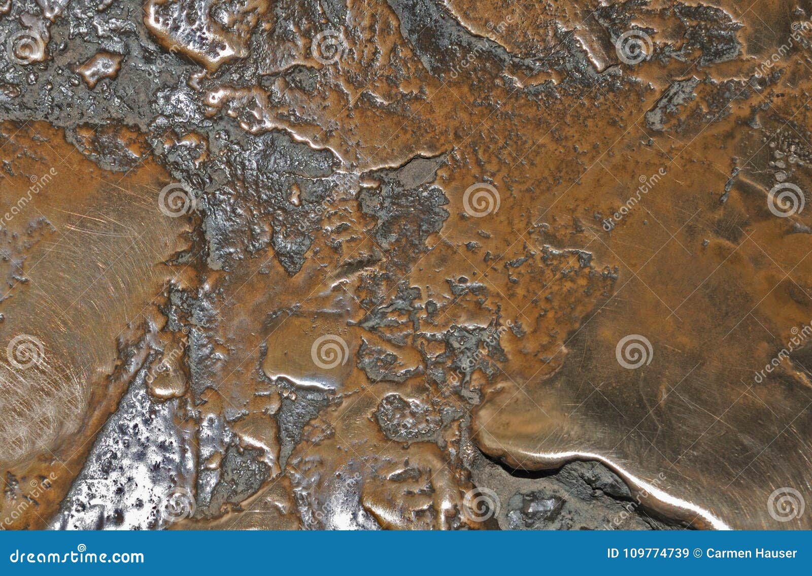 Cast-bronze with rough surface. Metal board of bronze, an alloy of copper and tin with rough texture