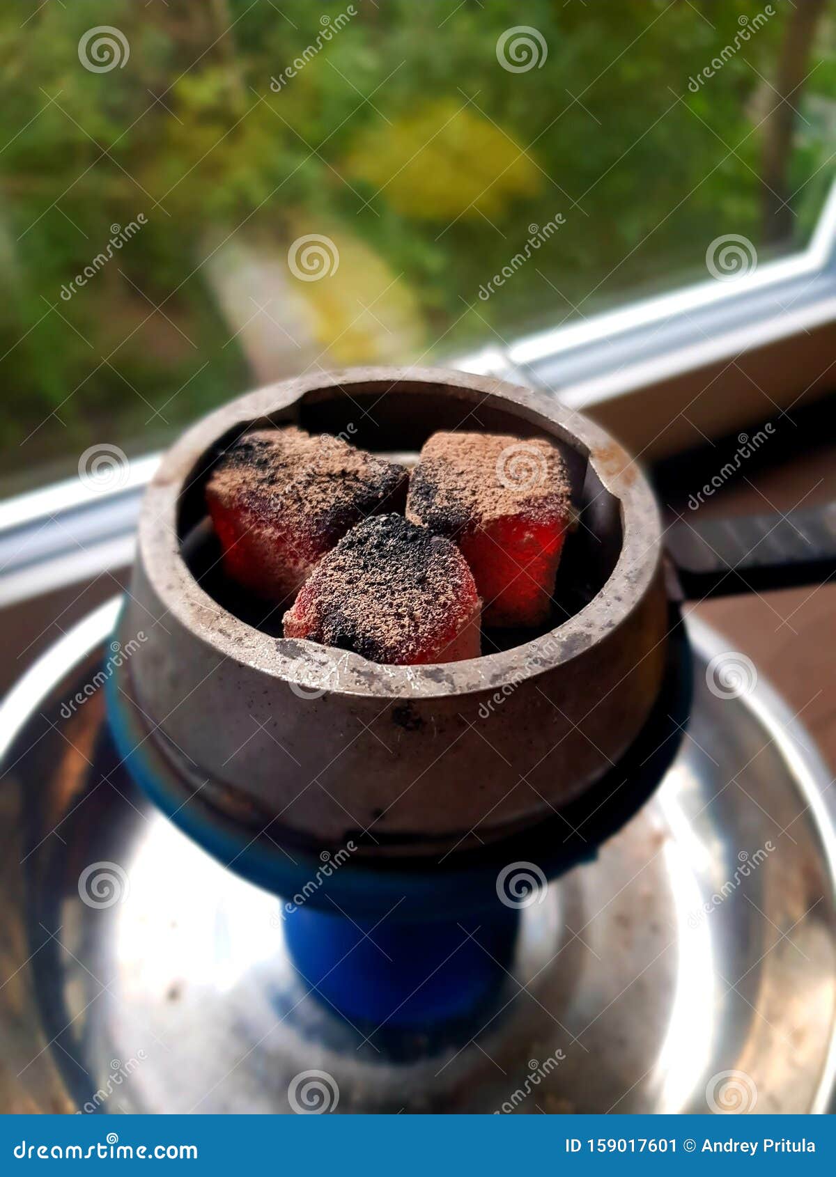 Metal Bowl Kaloud from a Hookah with Three Glowing Red Coals Stock