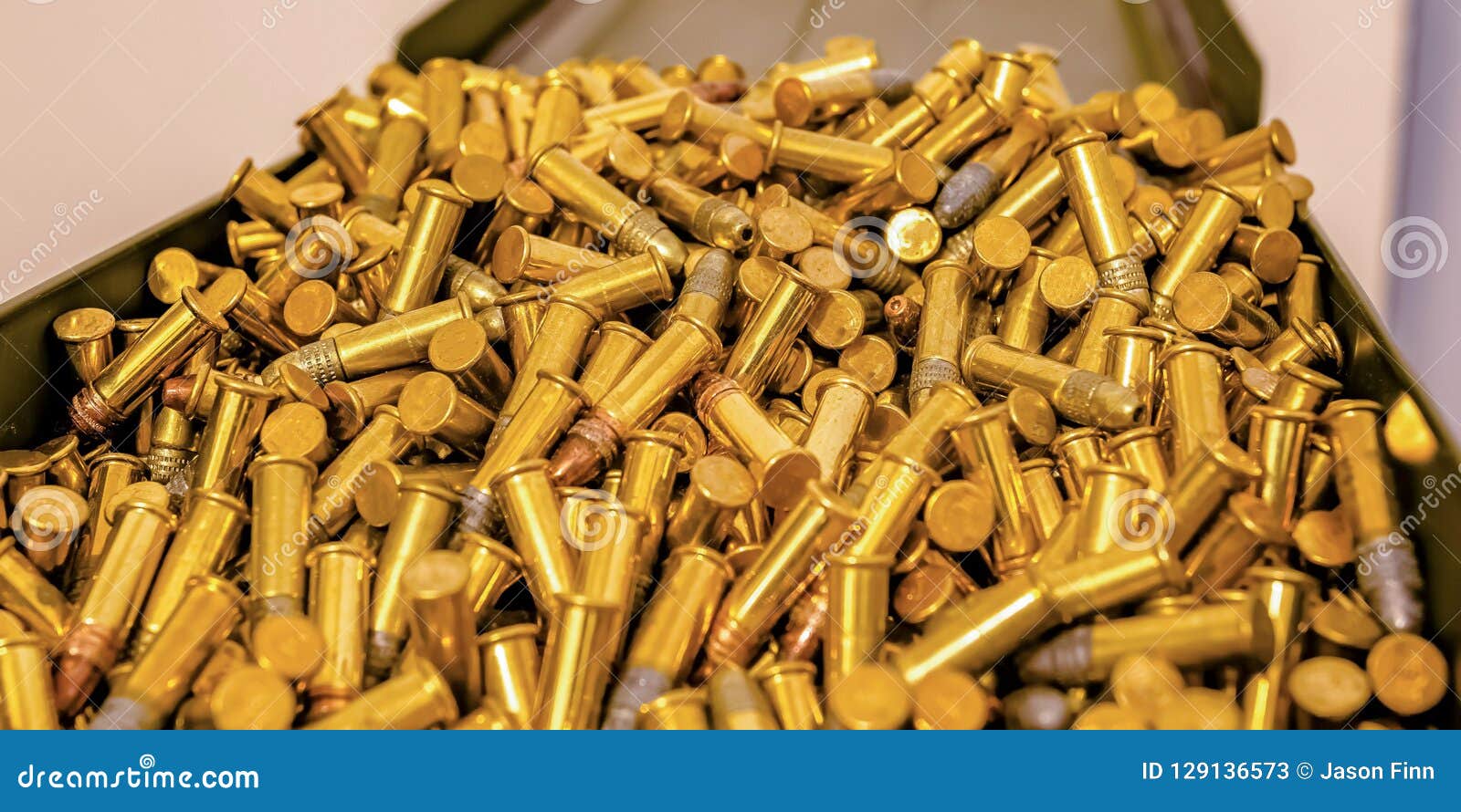 https://thumbs.dreamstime.com/z/metal-box-filled-cylindrical-golden-bullets-metal-box-filled-cylindrical-golden-bullets-close-up-view-metal-129136573.jpg