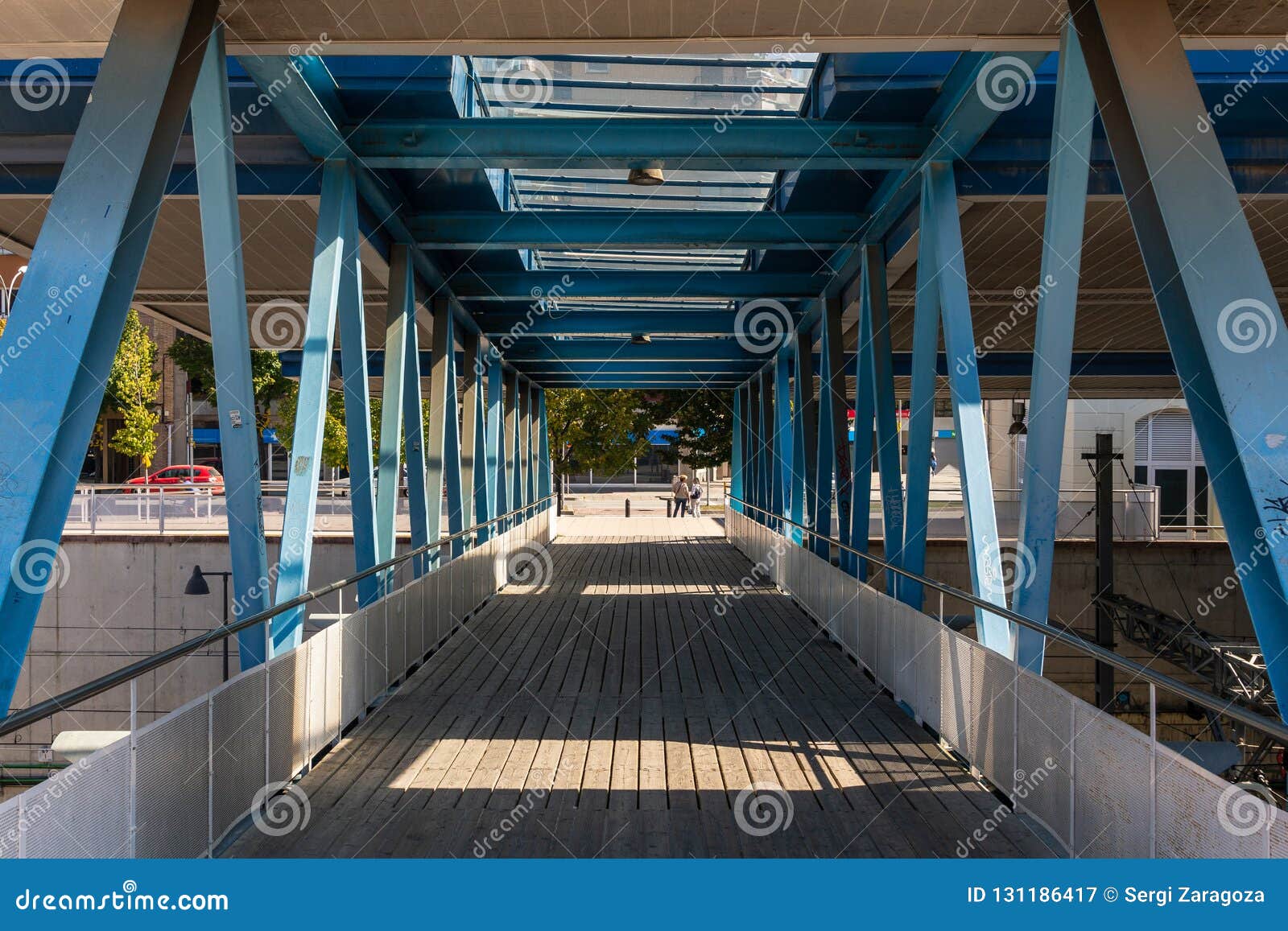 Metal Bridge with Wooden Floor and Ceiling Windows Editorial