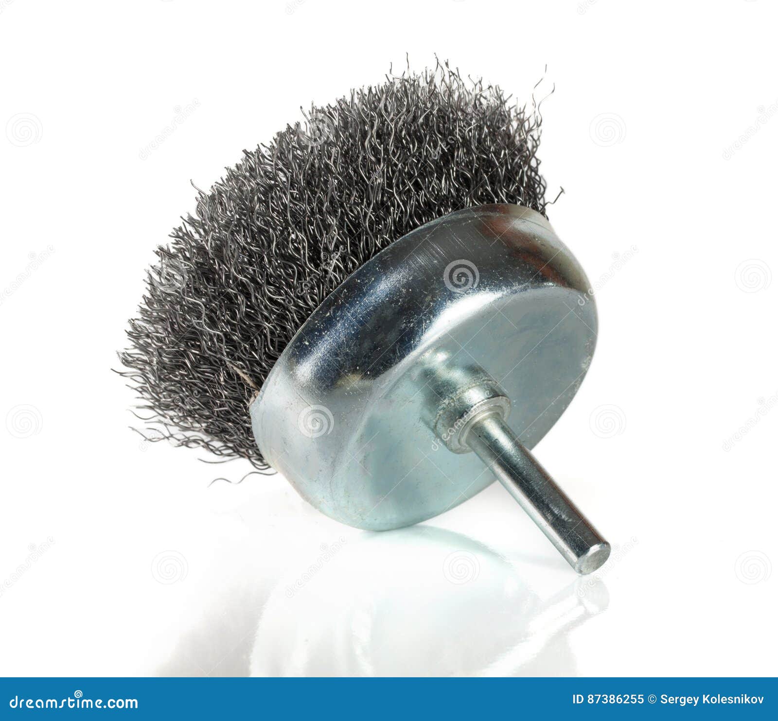 Metal Brush on a Drill To Remove Rust Isolated on White Background