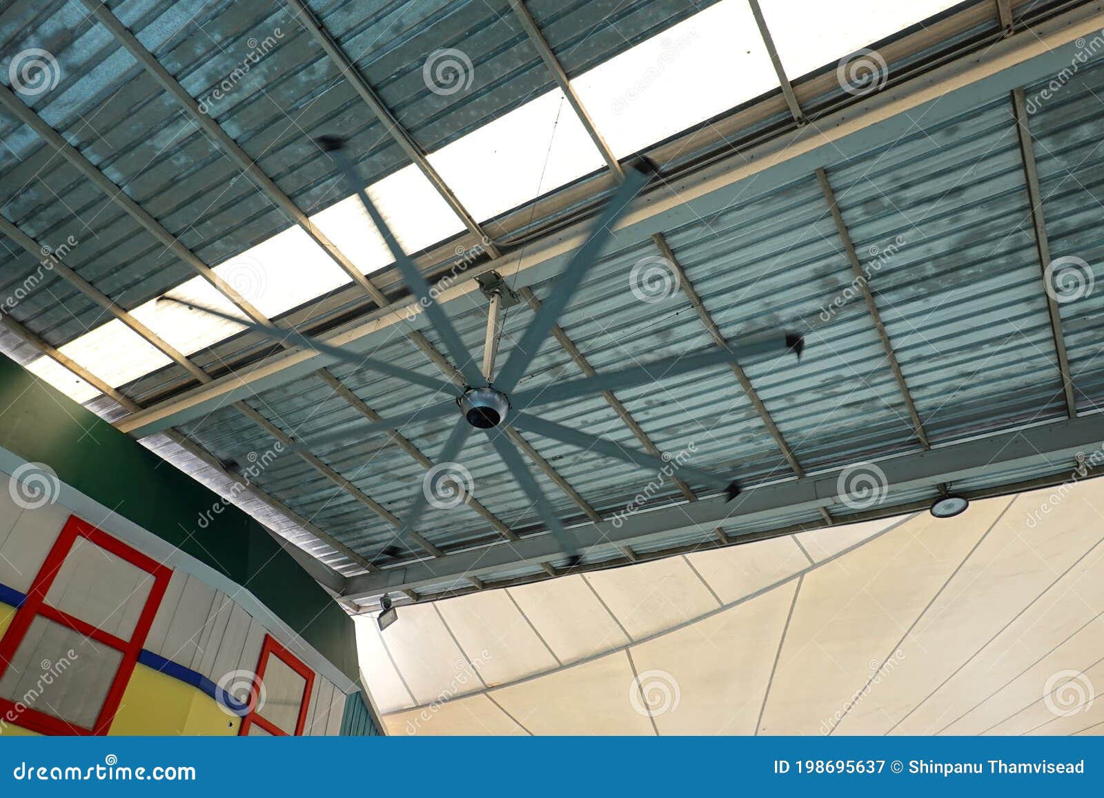 metal ceiling and large fans for open air shopping mall buildin