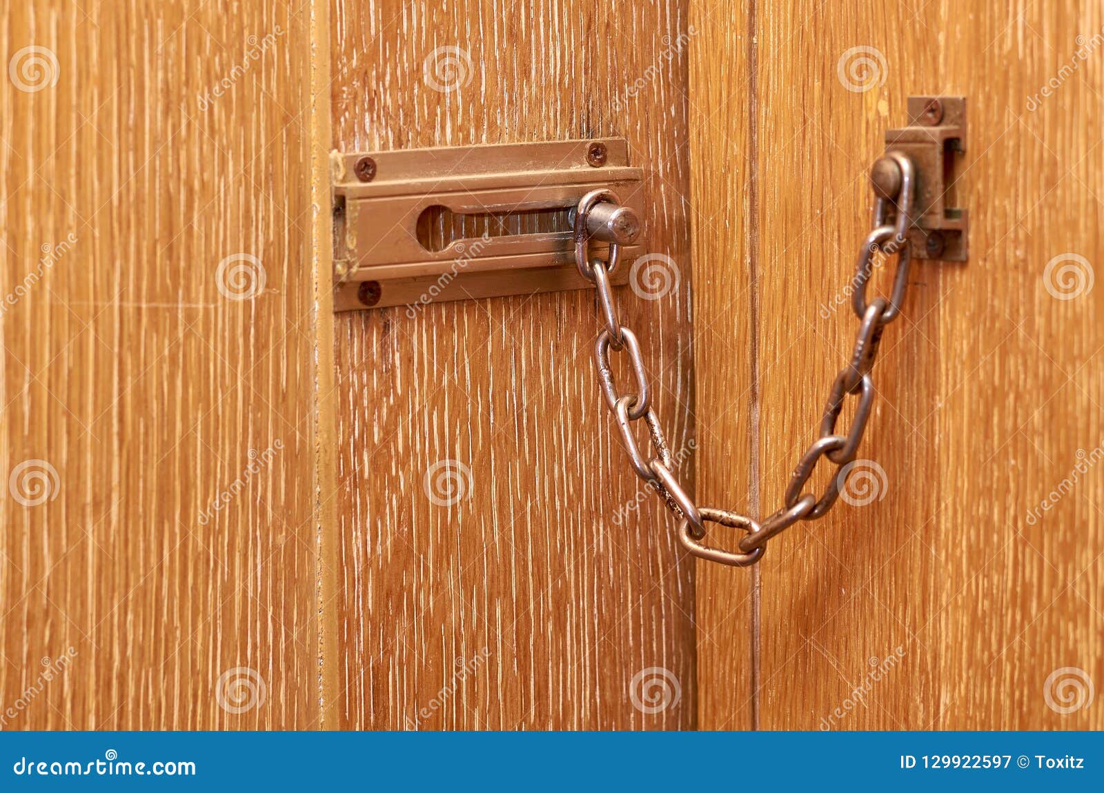 Metal Chain Lock on the Wooden Front Door Stock Image Image of protection, security 129922597