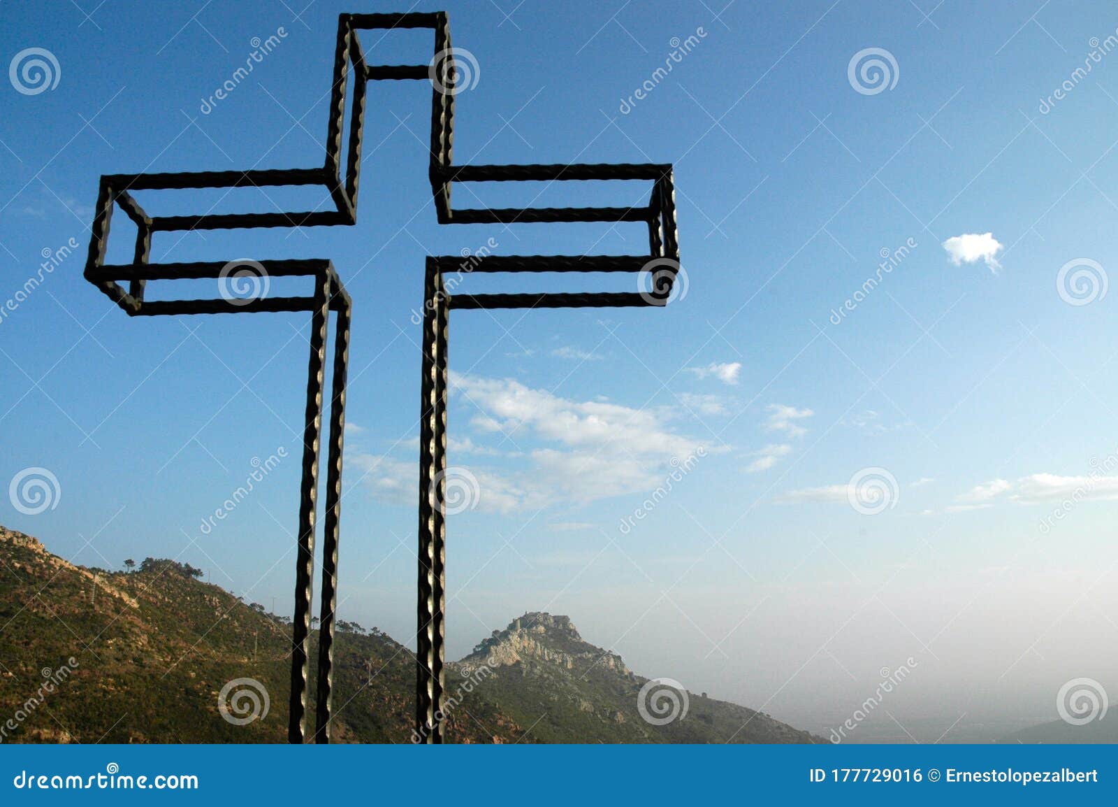 metal cross of the viewpoint of the desert of palms