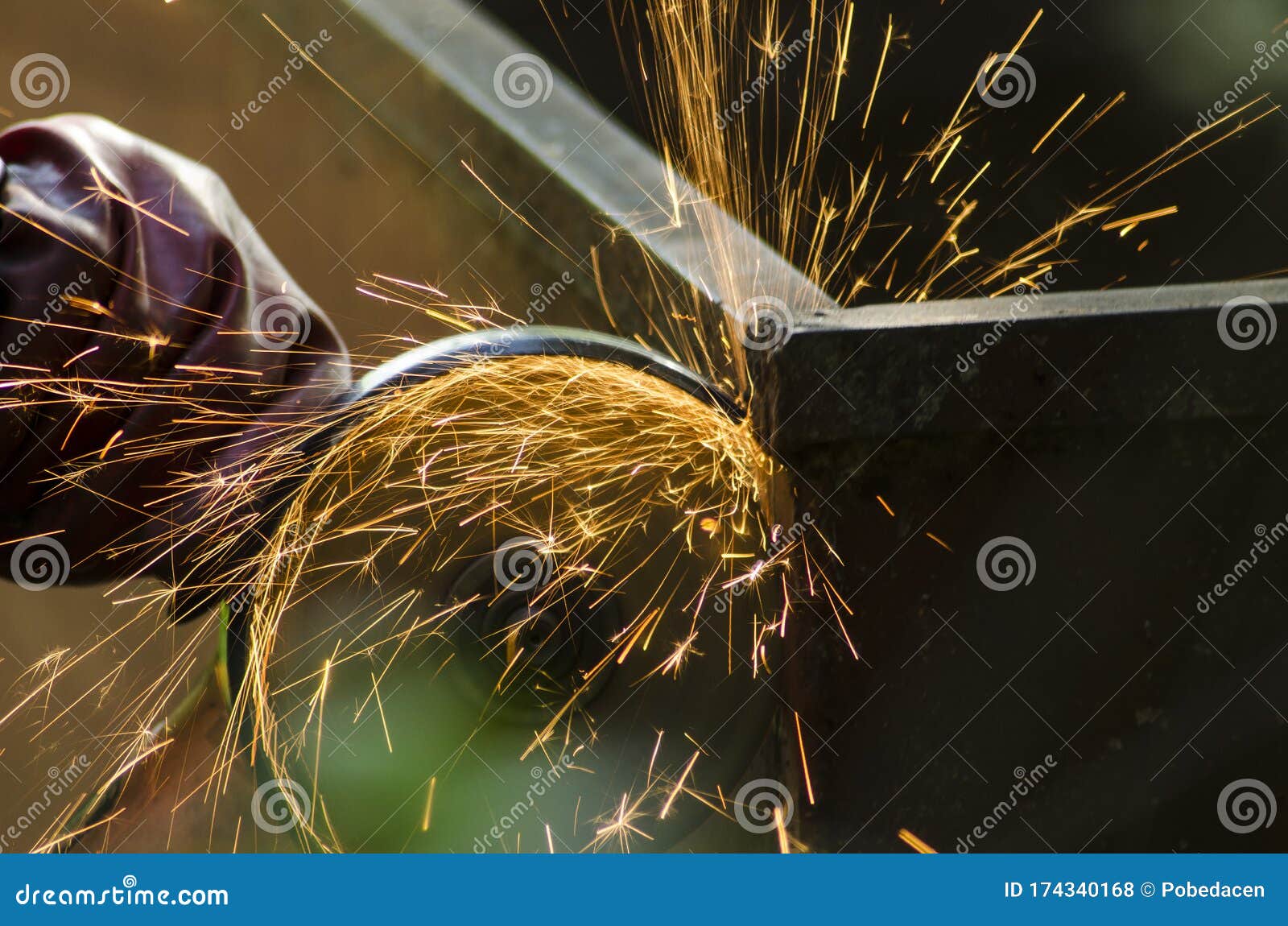 Metal Cutting. Metal Cutting with Angle Grinder.Man Cuts Metal Stock