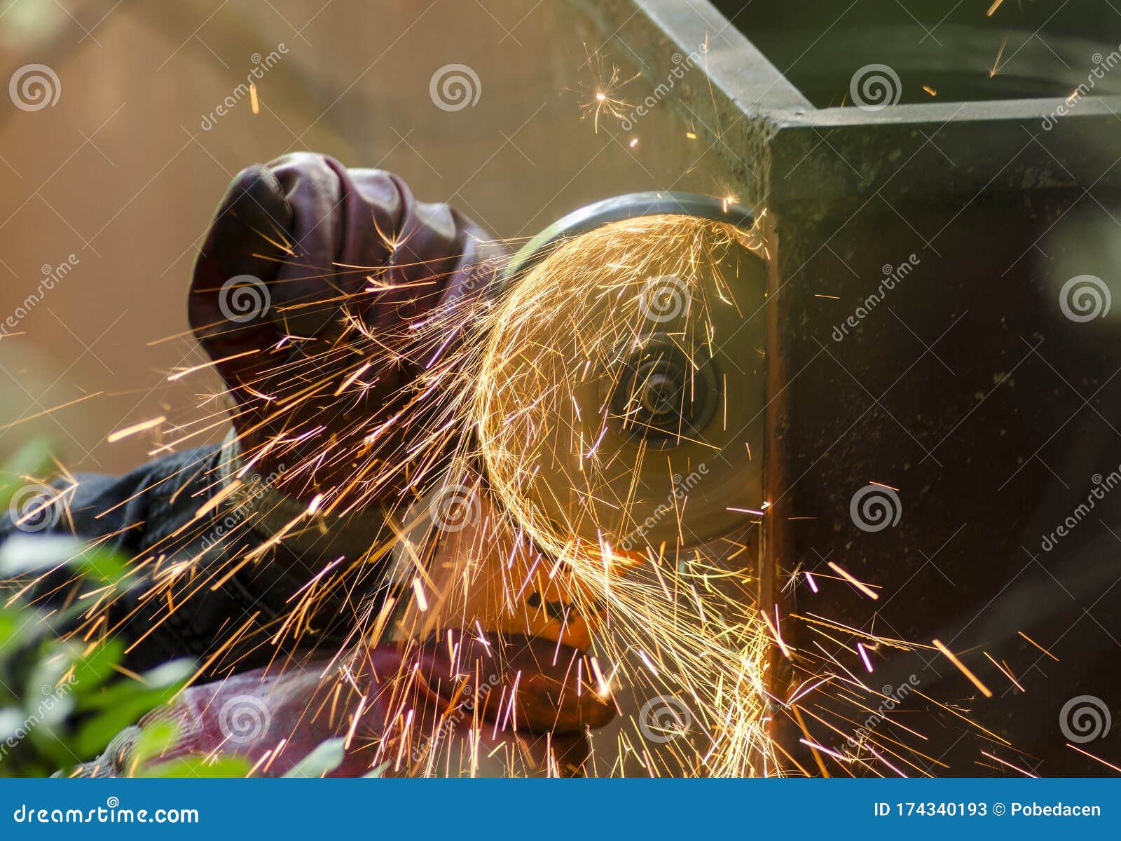 Metal Cutting. Metal Cutting with Angle Grinder.Man Cuts Metal Stock