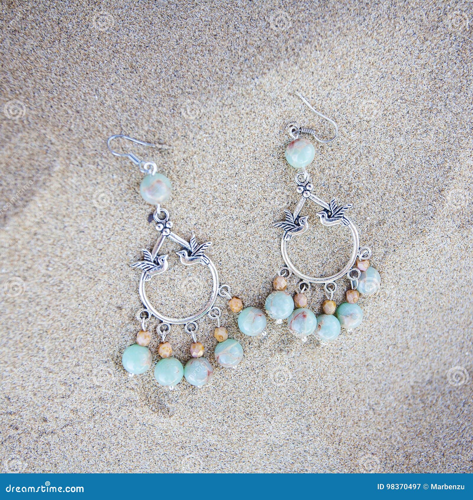 Metal earrings stock image. Image of modern, beach, earrings 98370497