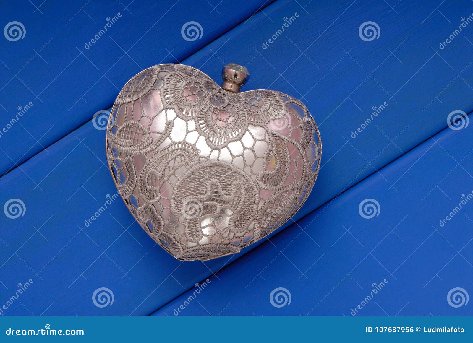 metal evening handbag, clutch has heart ,  of saint