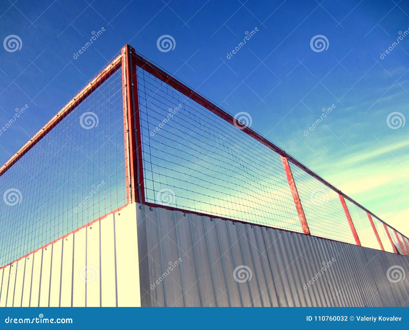 Metal Fence With Mesh. Protection Of Corrugated Sheet And Metal Mesh ...

