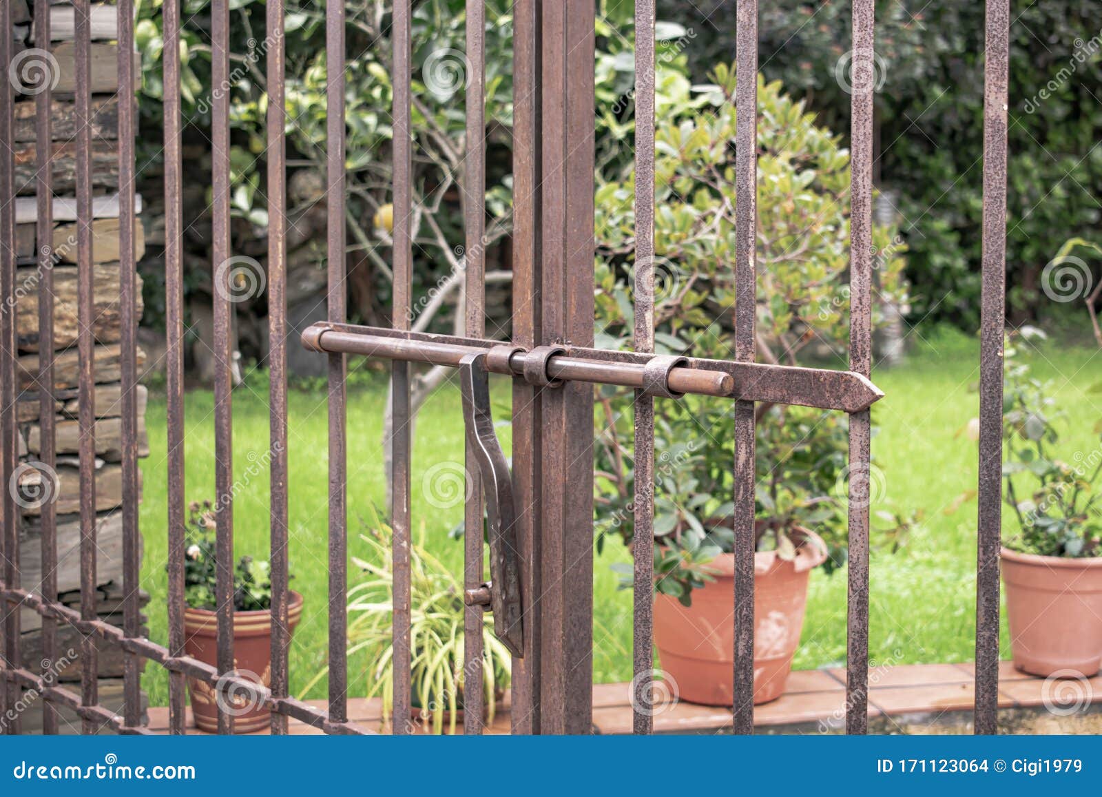 Metal Gate With Sliding Bar To Block Access To A Garden Stock Photo Image Of Architecture Cage